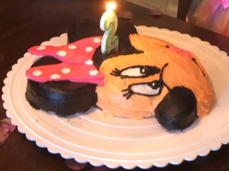 Minnie Mouse cake with a number 2 candle